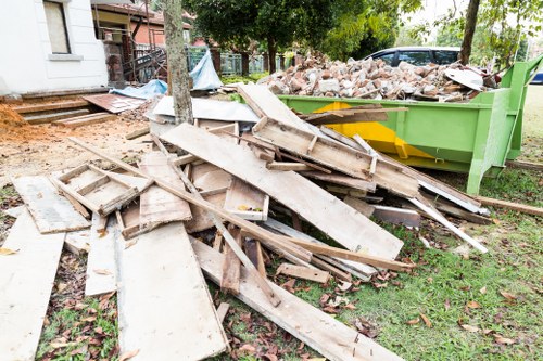 Collection of construction debris by muck away services