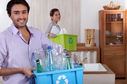 Professional movers handling furniture in a Blackheath home